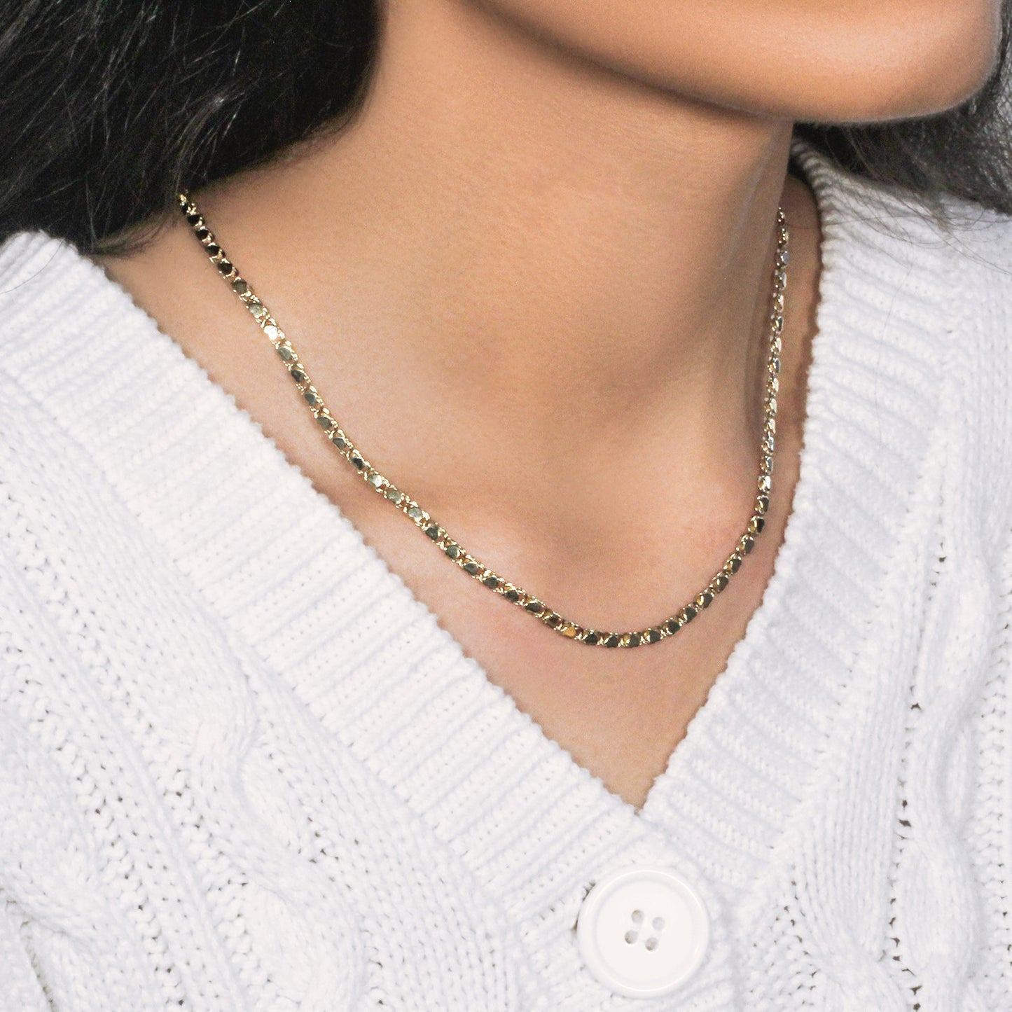 Peelerie jewelry piece in midnight luxury editorial product photo, high-contrast studio lighting