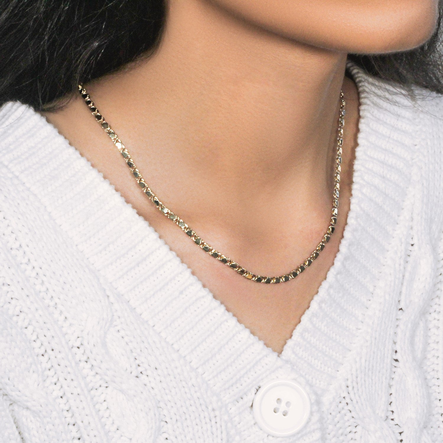 Peelerie jewelry piece in midnight luxury editorial product photo, high-contrast studio lighting