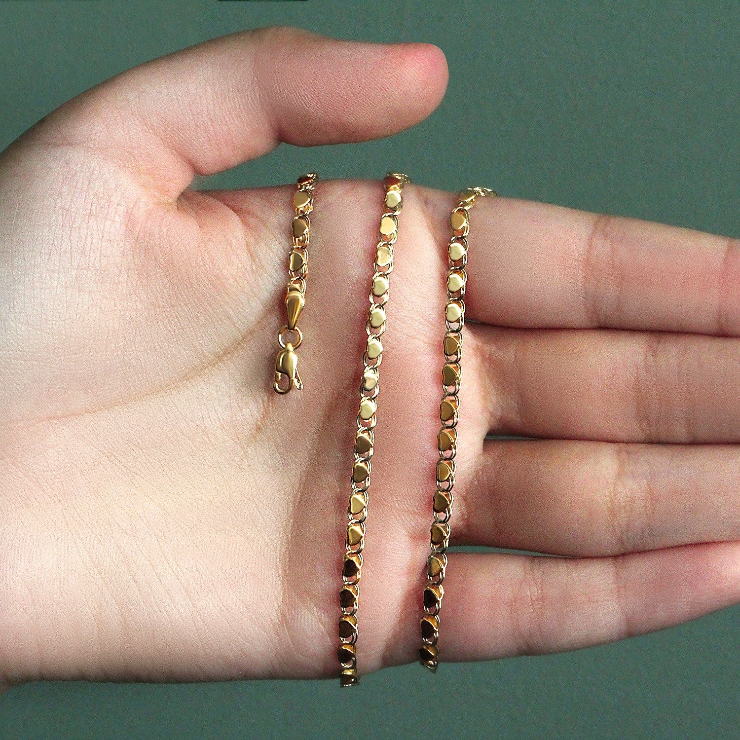 Peelerie jewelry piece in midnight luxury editorial product photo, high-contrast studio lighting