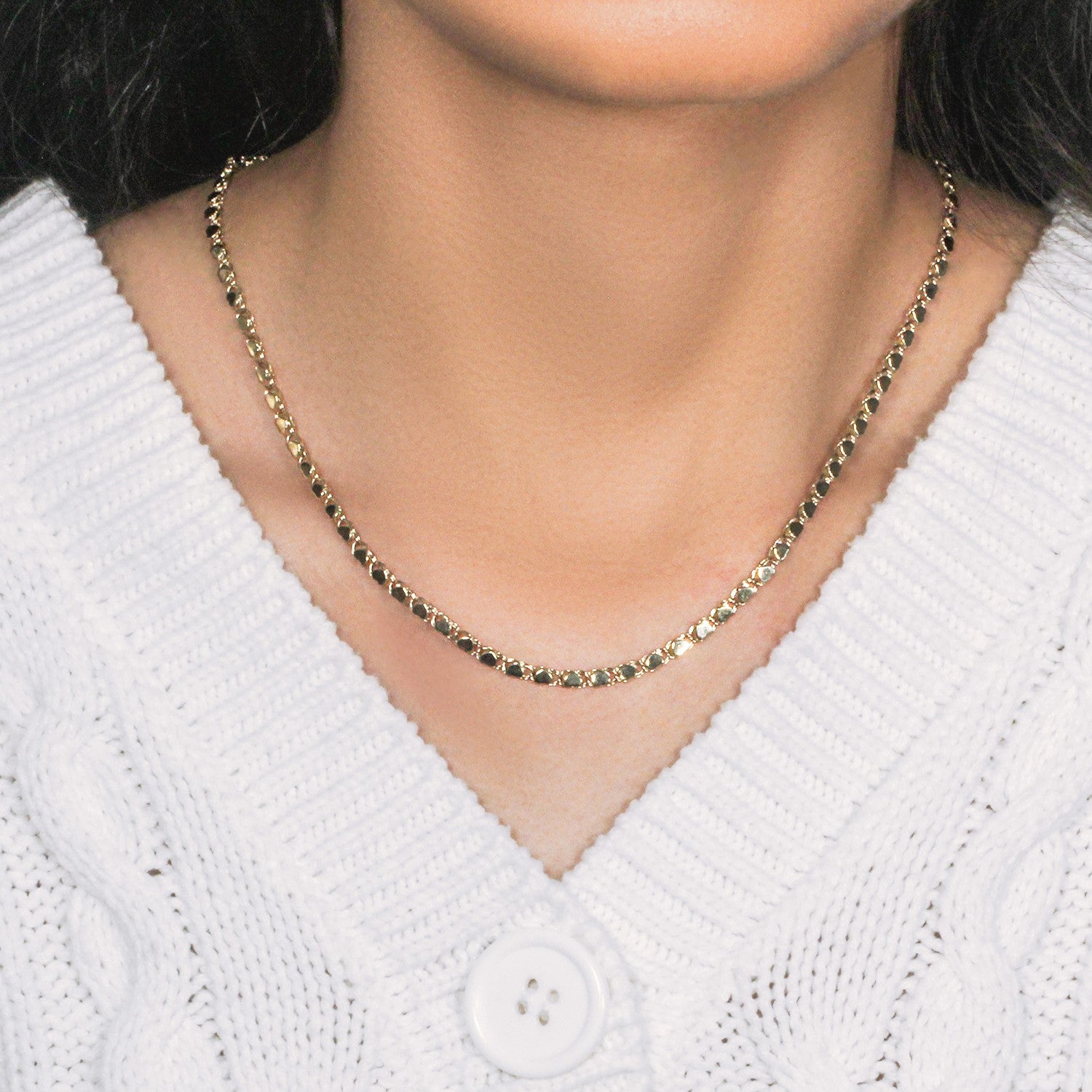 Peelerie jewelry piece in midnight luxury editorial product photo, high-contrast studio lighting