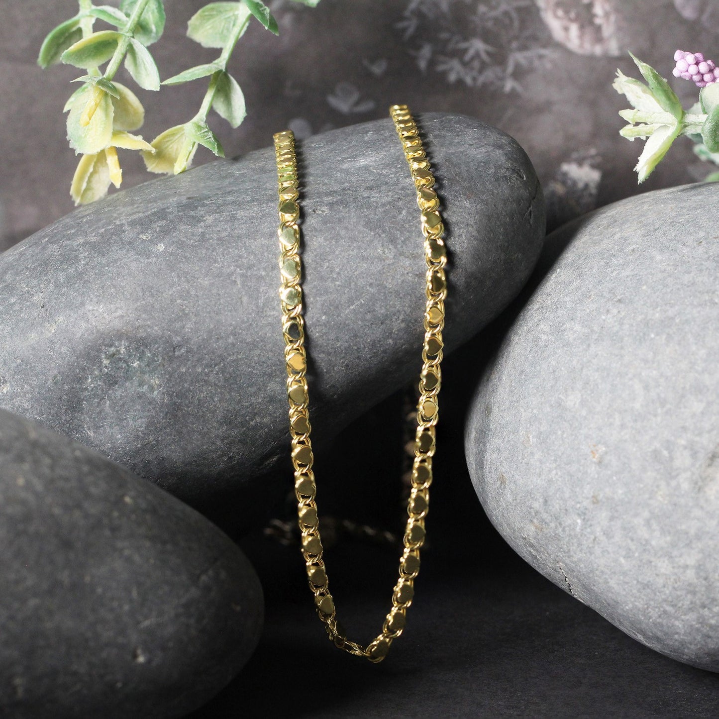 Peelerie jewelry piece in midnight luxury editorial product photo, high-contrast studio lighting