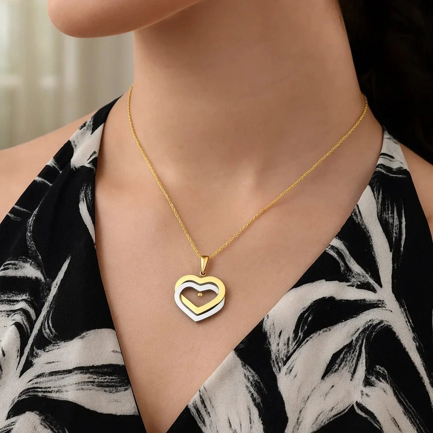 14k Two-Tone Gold Intertwined Hearts Pendant - Peelerie