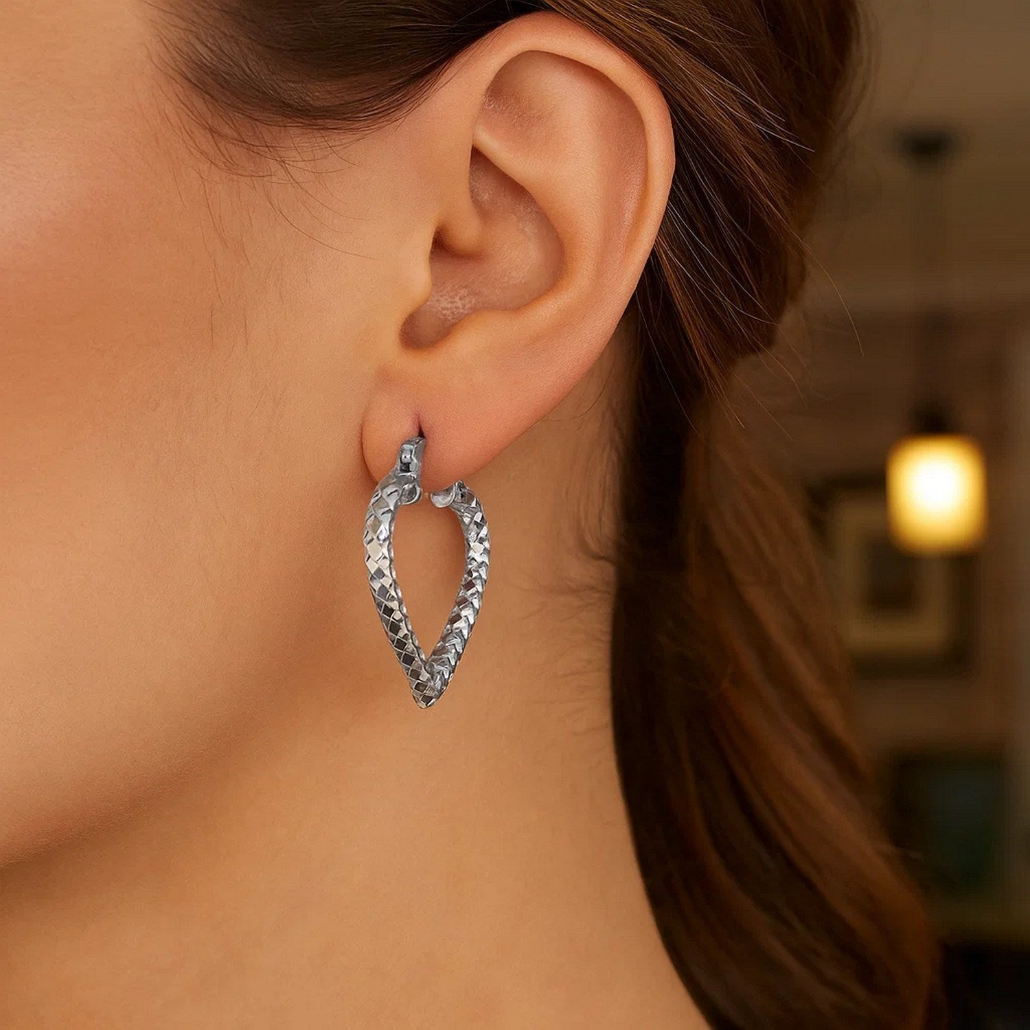 Peelerie jewelry piece in midnight luxury editorial product photo, high-contrast studio lighting