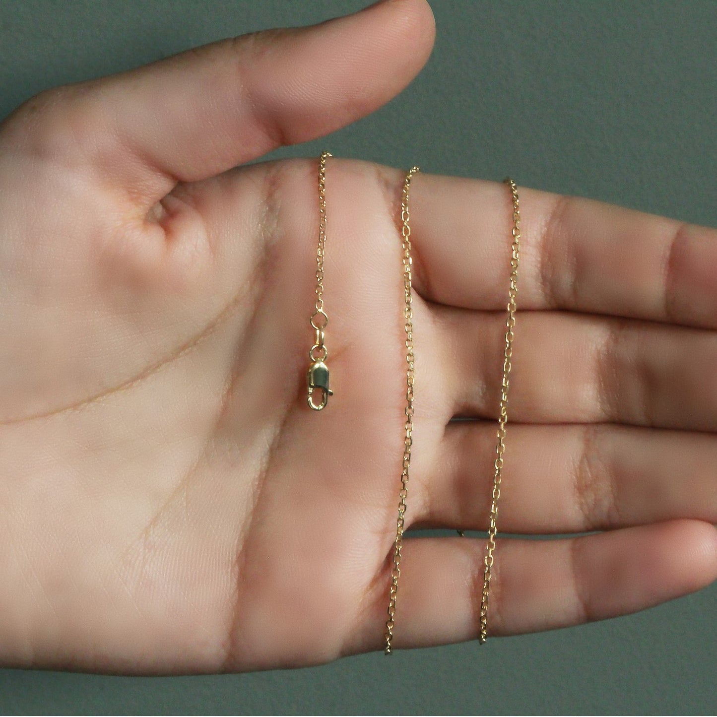 Peelerie jewelry piece in midnight luxury editorial product photo, high-contrast studio lighting