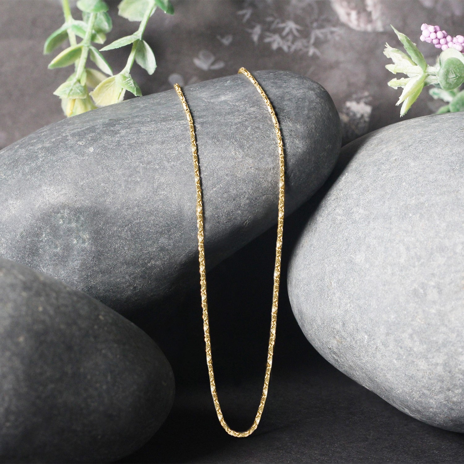14k Yellow Gold Lumina Pendant Chain (0.90 mm) in a sleek high-contrast midnight luxury editorial style