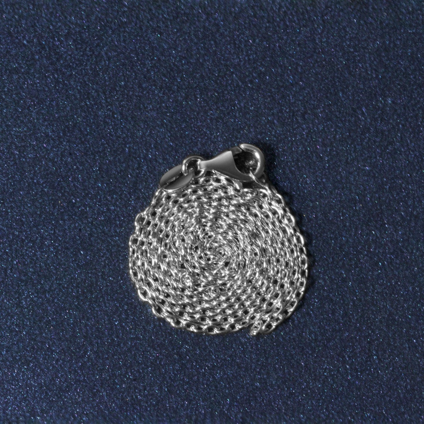 Peelerie jewelry piece in midnight luxury editorial product photo, high-contrast studio lighting