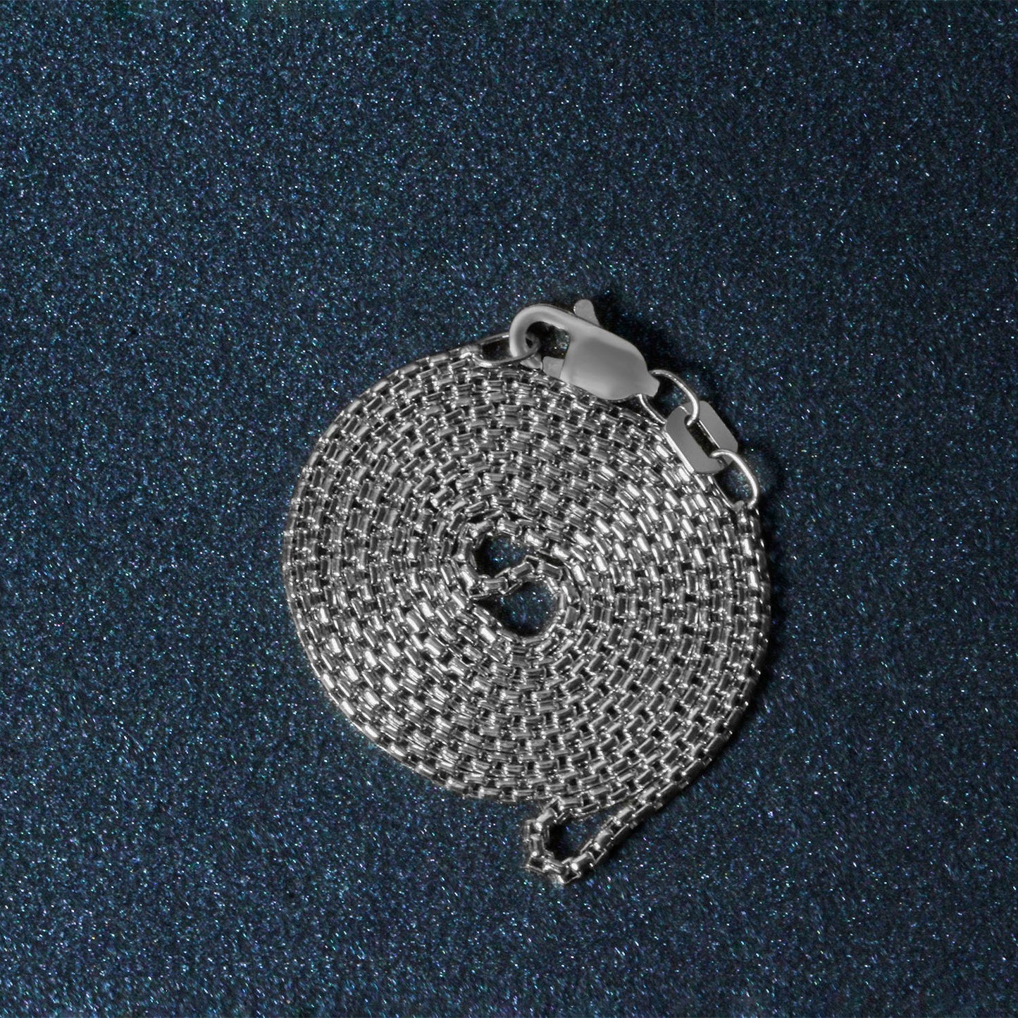 Peelerie jewelry piece in midnight luxury editorial product photo, high-contrast studio lighting