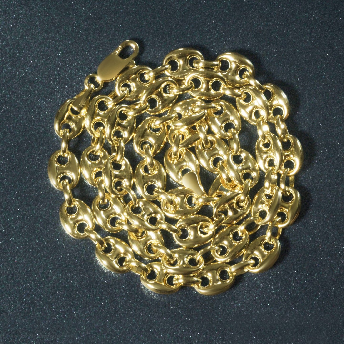 Peelerie jewelry piece in midnight luxury editorial product photo, high-contrast studio lighting