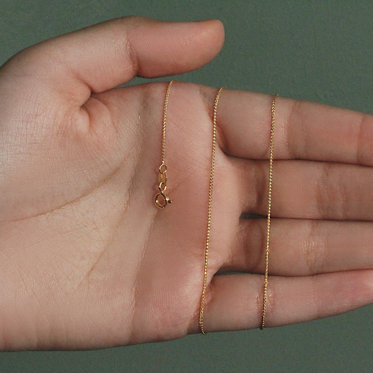 Peelerie jewelry piece in midnight luxury editorial product photo, high-contrast studio lighting