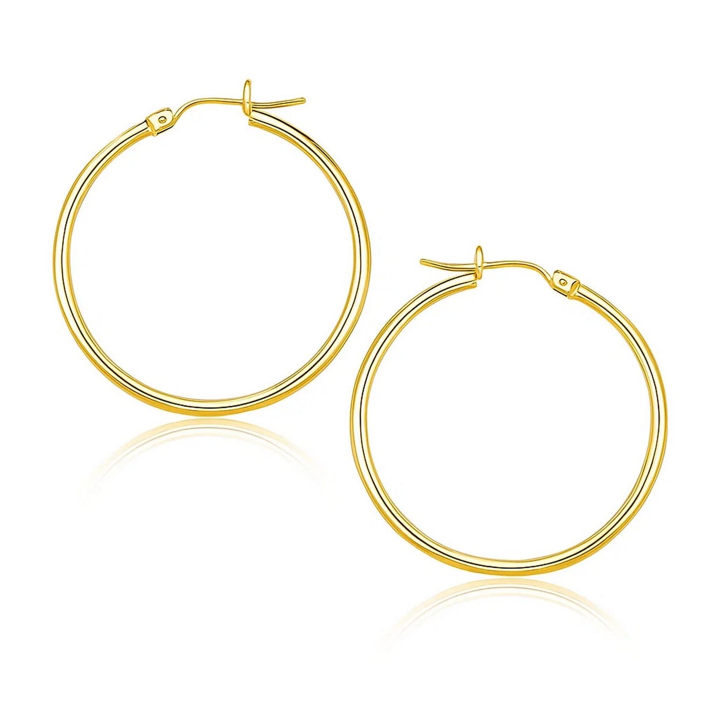 14k Yellow Gold Polished Hoop Earrings (1.5x25mm) in a sleek high-contrast midnight luxury editorial style