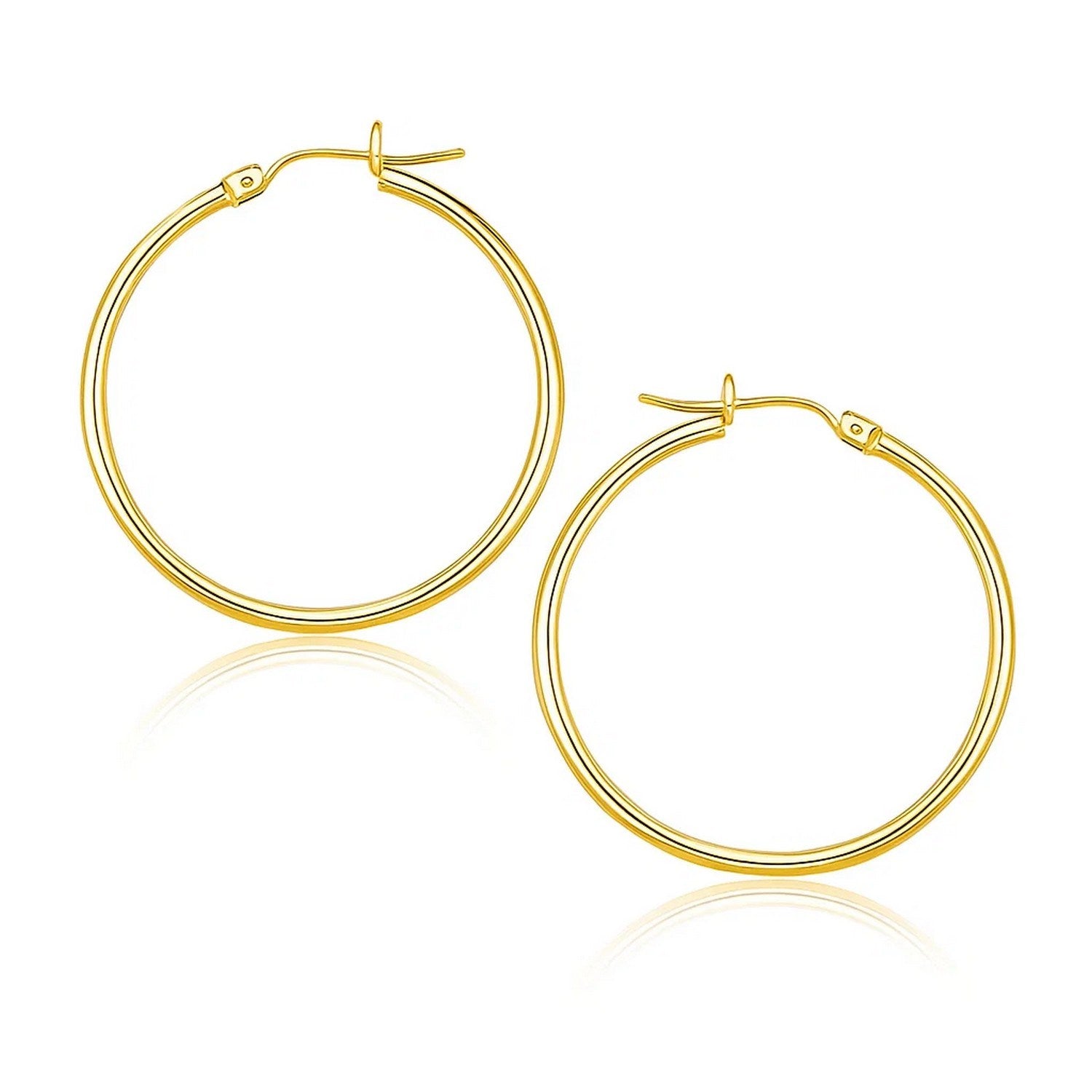14k Yellow Gold Polished Hoop Earrings (1.5x25mm) in a sleek high-contrast midnight luxury editorial style