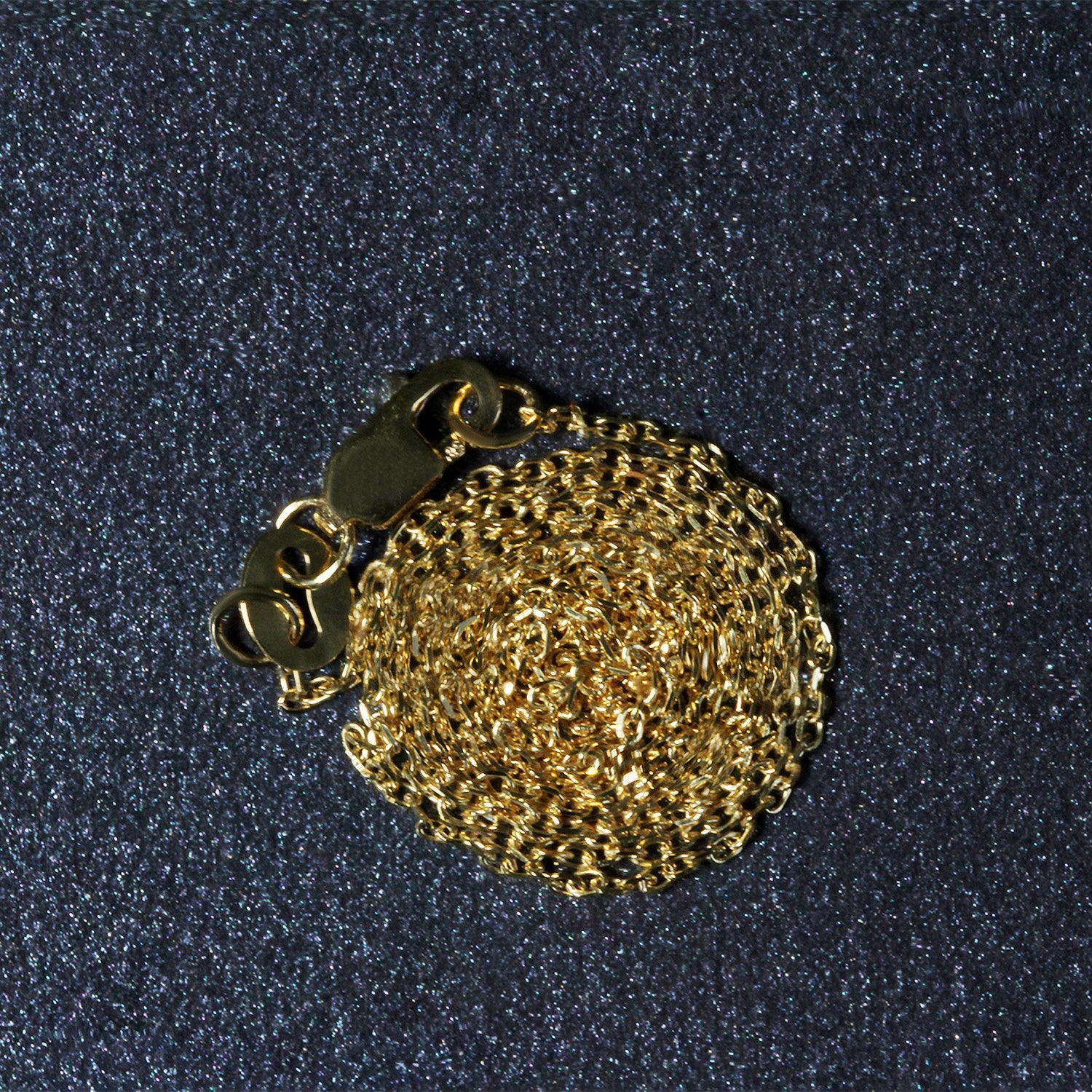 Peelerie jewelry piece in midnight luxury editorial product photo, high-contrast studio lighting