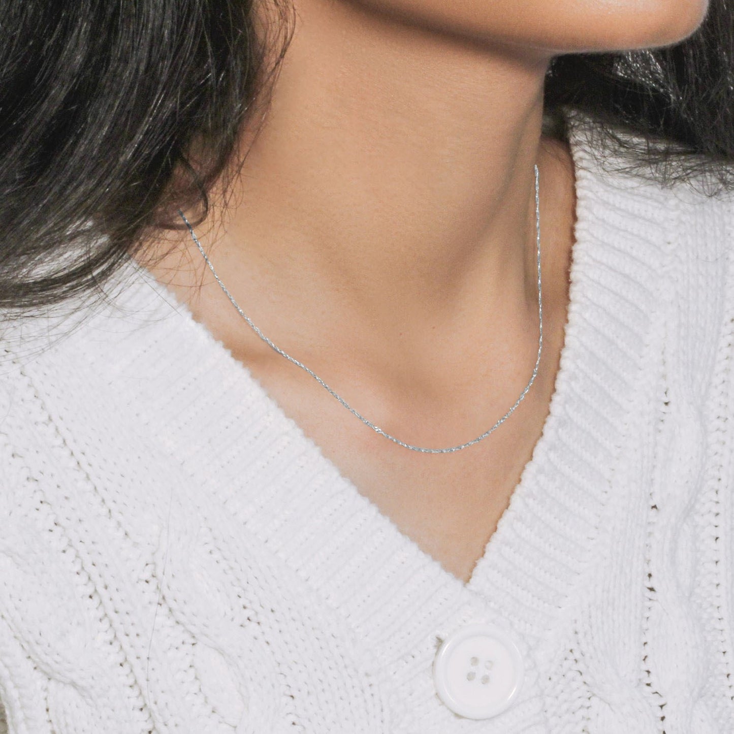 Peelerie jewelry piece in midnight luxury editorial product photo, high-contrast studio lighting