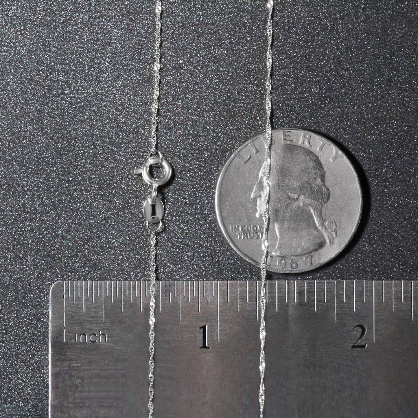 Peelerie jewelry piece in midnight luxury editorial product photo, high-contrast studio lighting