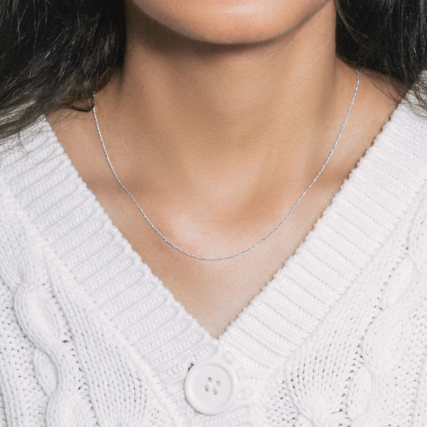 Peelerie jewelry piece in midnight luxury editorial product photo, high-contrast studio lighting