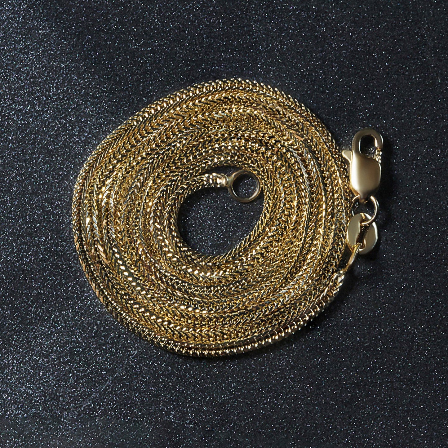 Peelerie jewelry piece in midnight luxury editorial product photo, high-contrast studio lighting