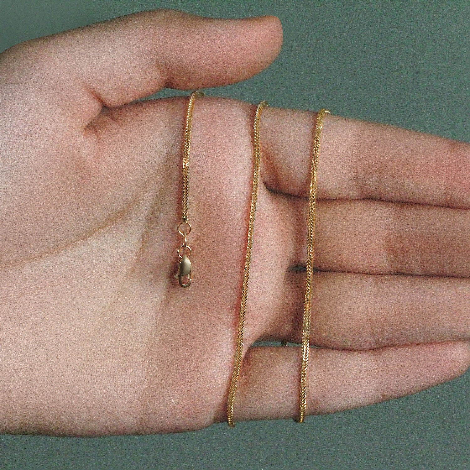 Peelerie jewelry piece in midnight luxury editorial product photo, high-contrast studio lighting