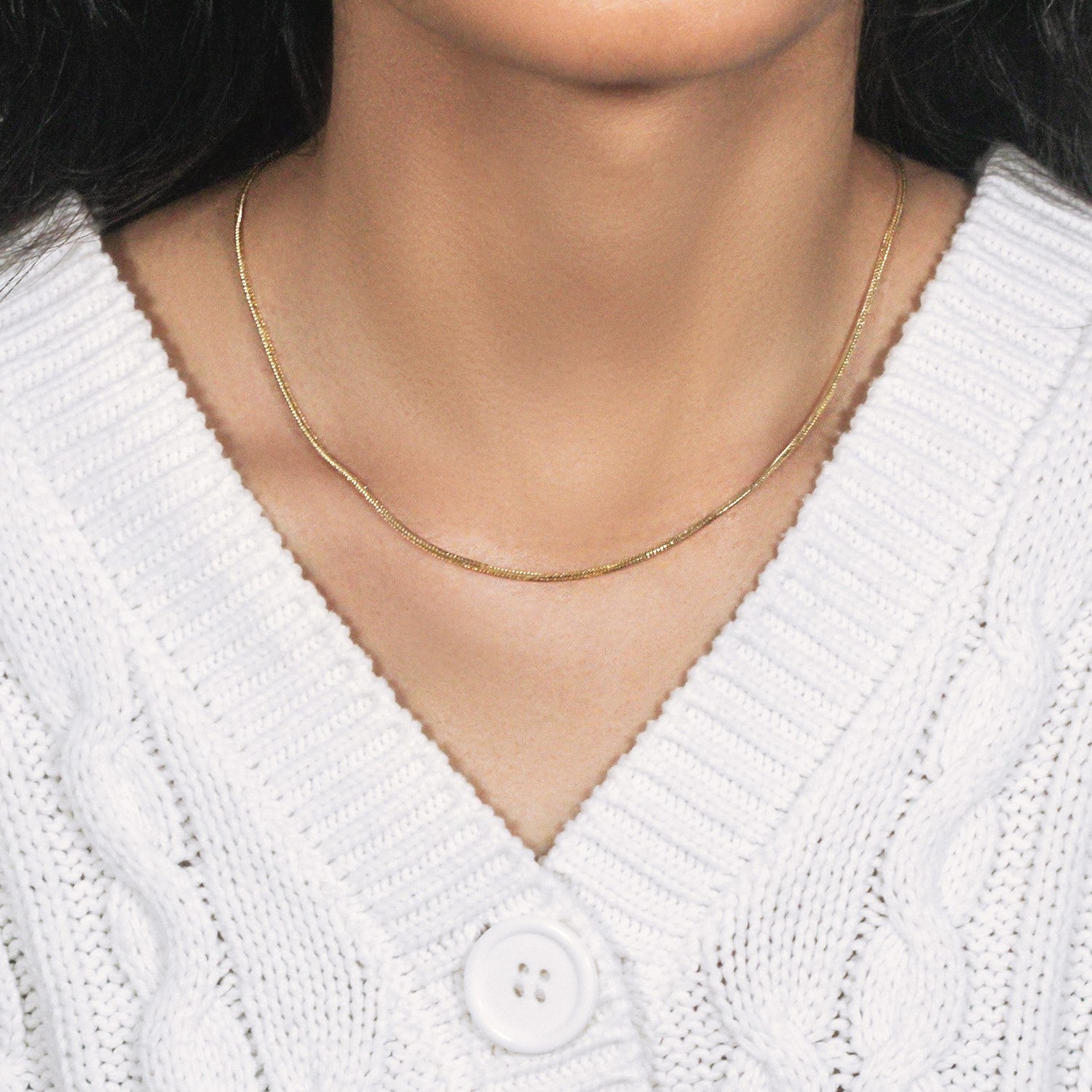 Peelerie jewelry piece in midnight luxury editorial product photo, high-contrast studio lighting