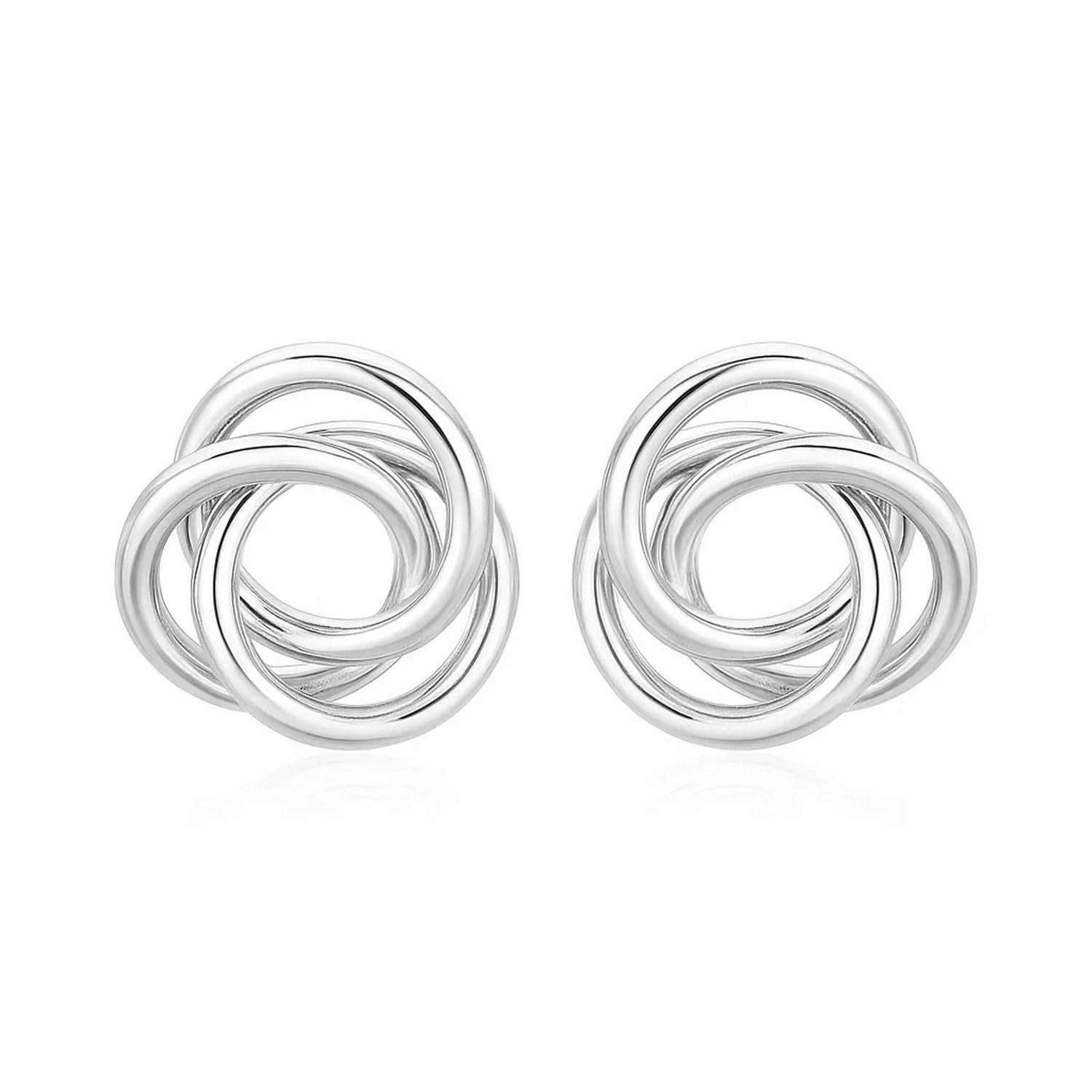 Polished Open Love Knot Earrings in Sterling Silver in a sleek high-contrast midnight luxury editorial style