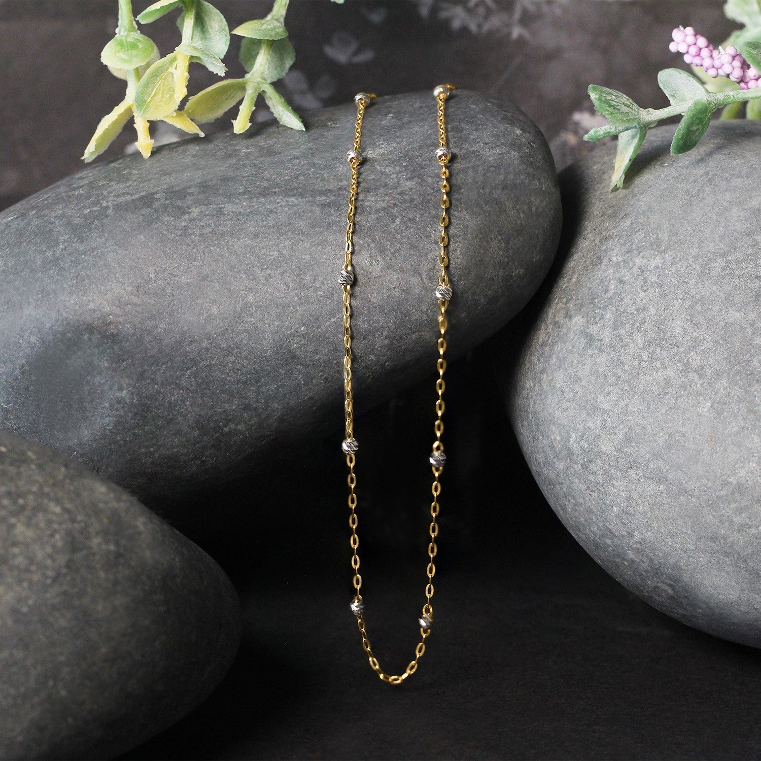 Diamond Cut Bead Links Pendant Chain in Two Tone Gold (3.50 mm) in a sleek high-contrast midnight luxury editorial style
