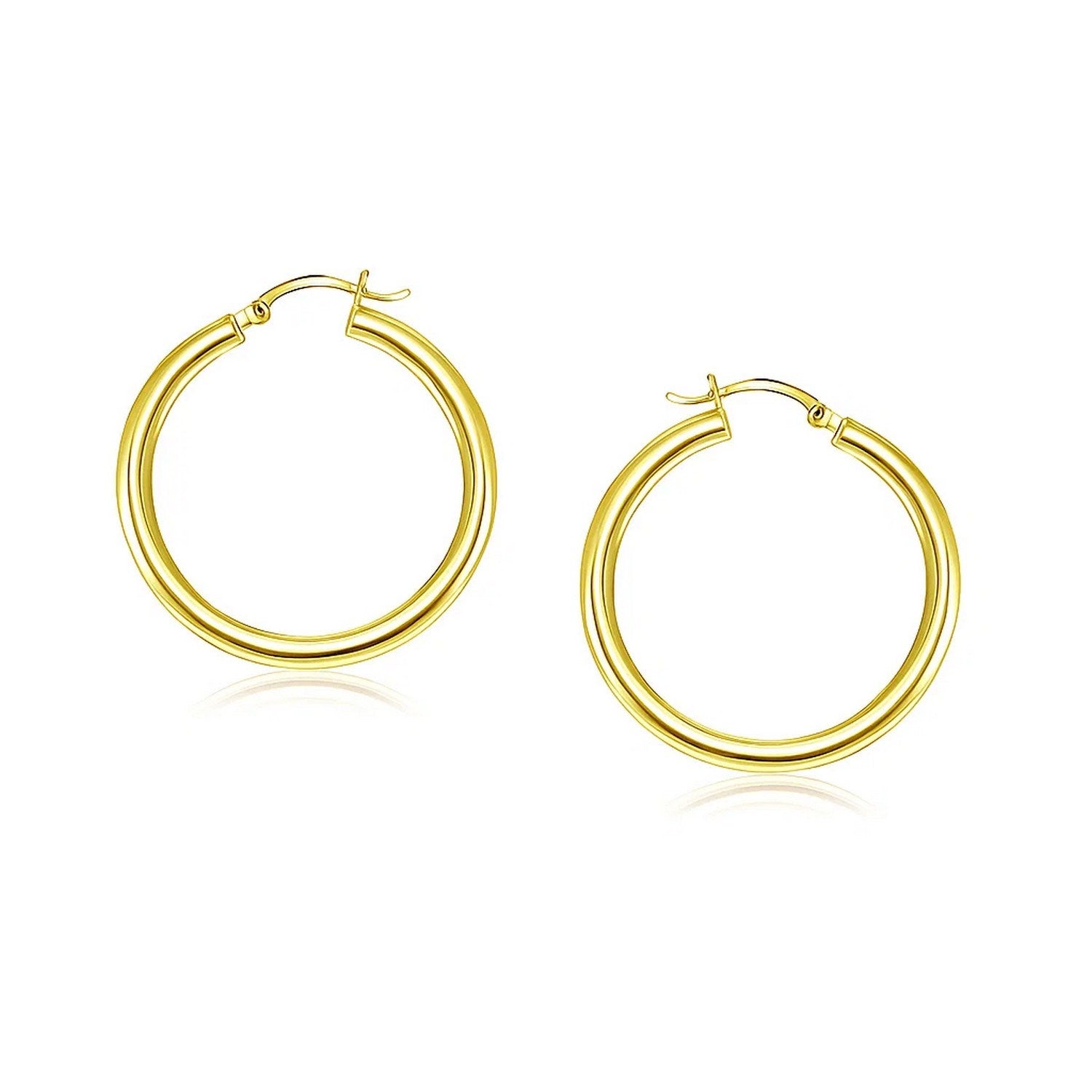 14k Yellow Gold Polished Hoop Earrings (4x25mm) in a sleek high-contrast midnight luxury editorial style