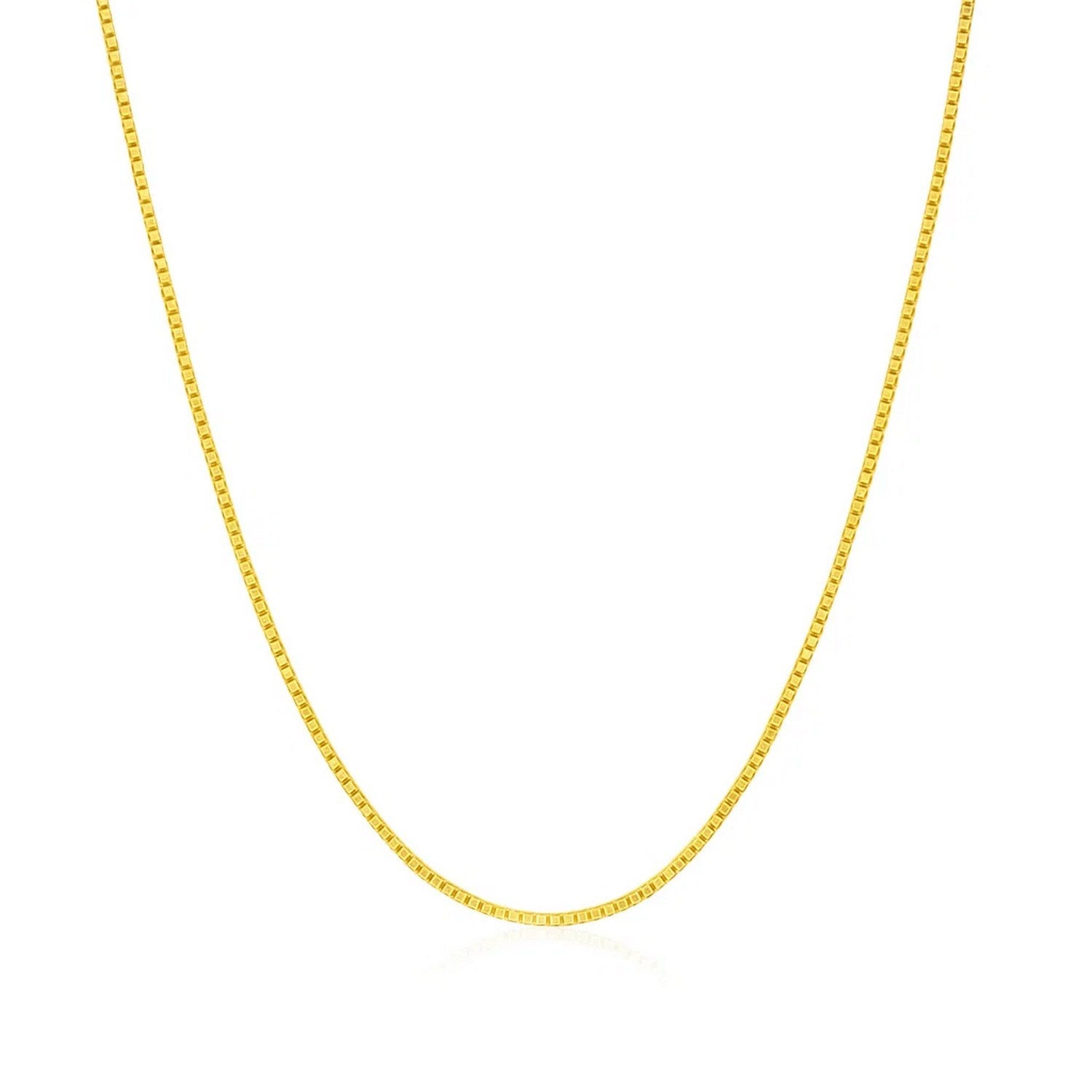 14k Yellow Gold Classic Box Chain (0.75 mm) in a sleek high-contrast midnight luxury editorial style