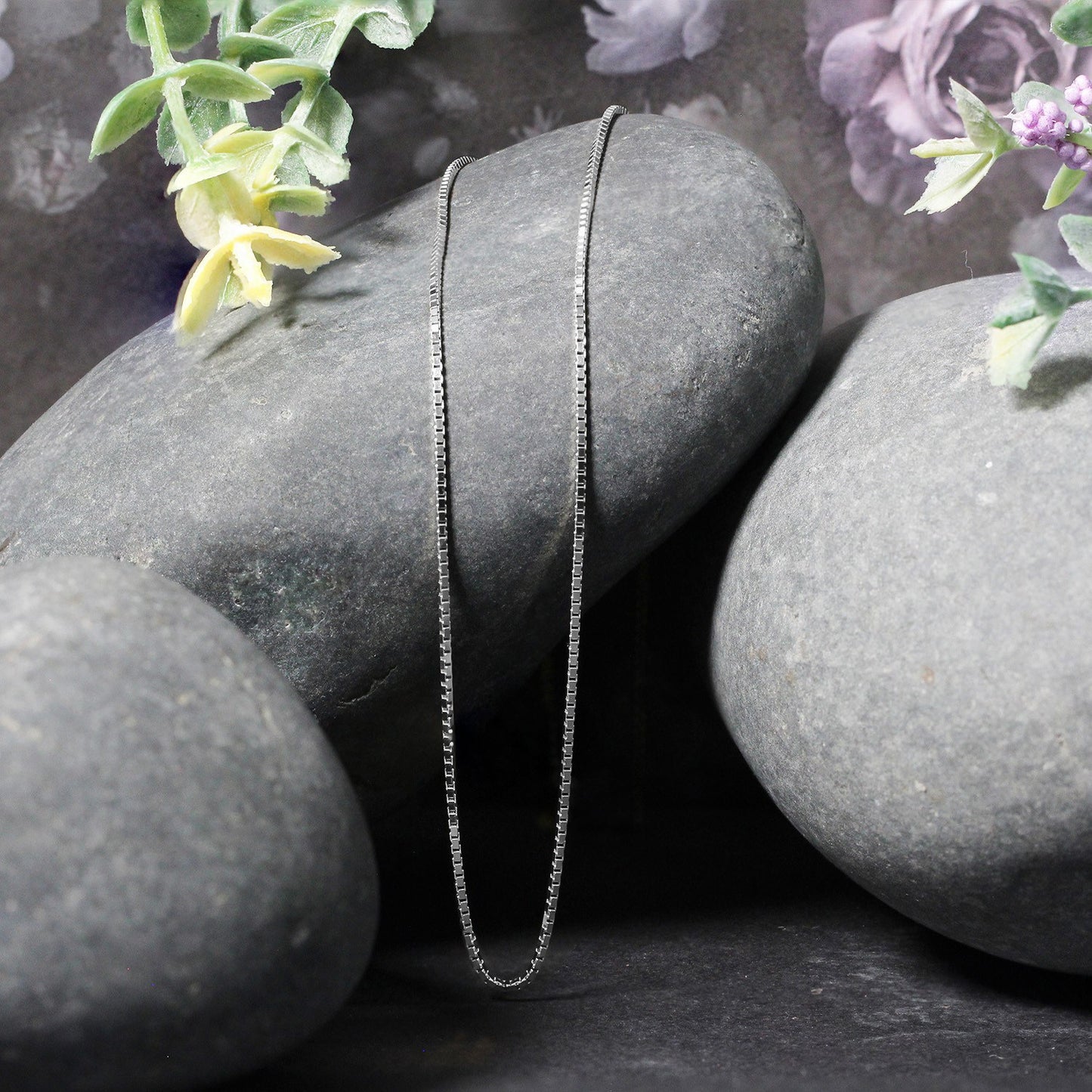 Peelerie jewelry piece in gold midnight luxury editorial product photo, high-contrast studio lighting