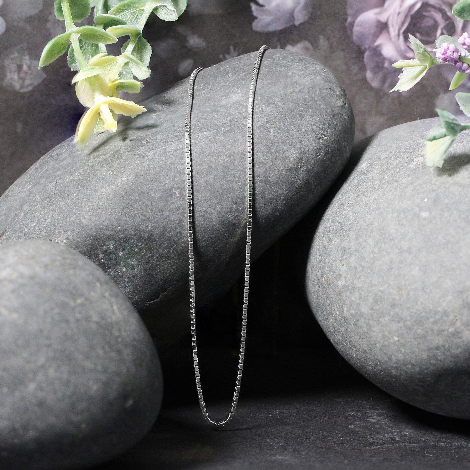 Peelerie jewelry piece in gold midnight luxury editorial product photo, high-contrast studio lighting