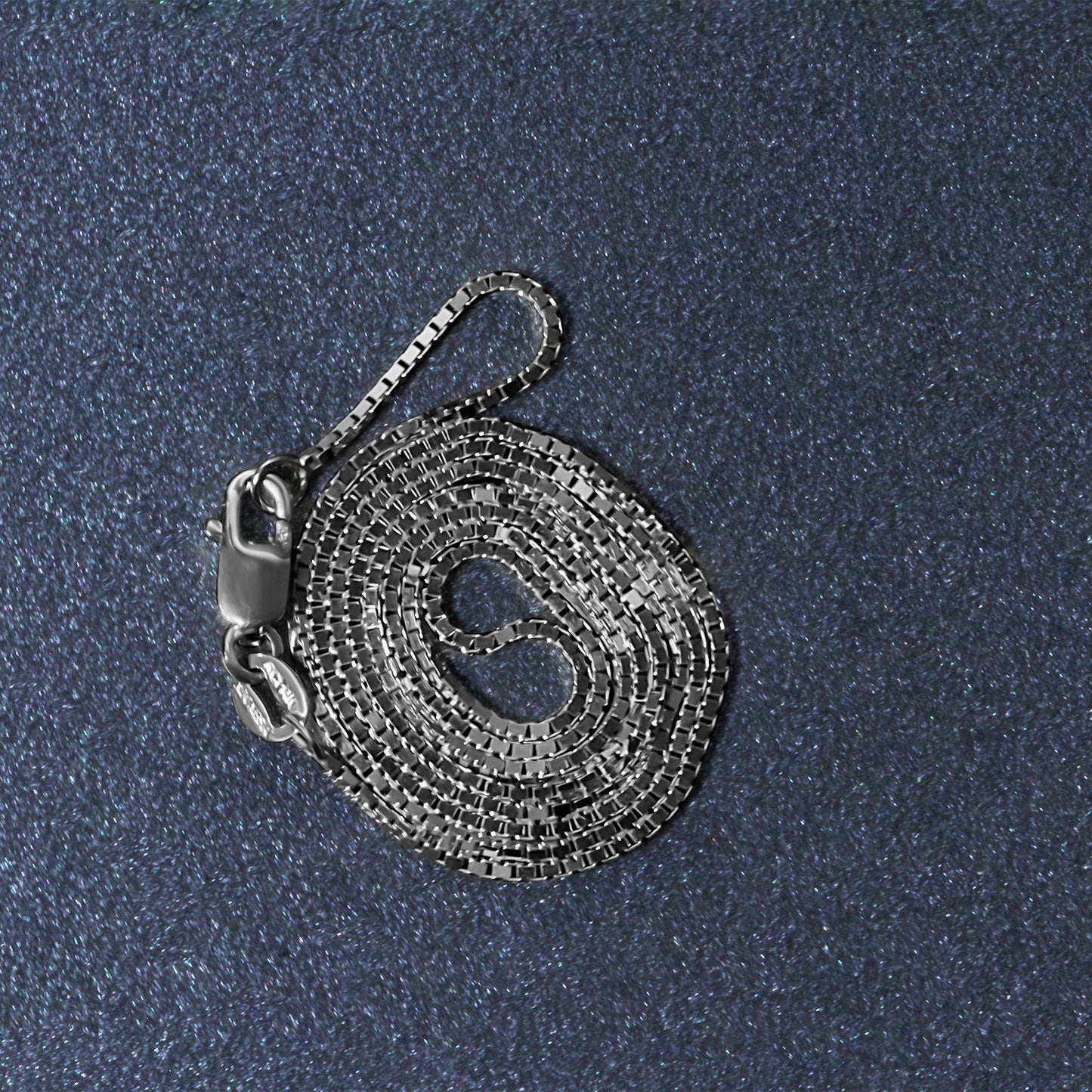 Peelerie jewelry piece in gold midnight luxury editorial product photo, high-contrast studio lighting