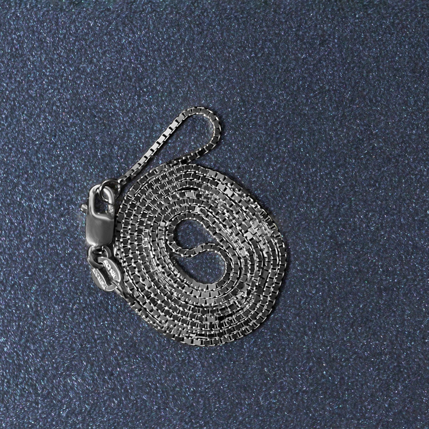 Peelerie jewelry piece in gold midnight luxury editorial product photo, high-contrast studio lighting