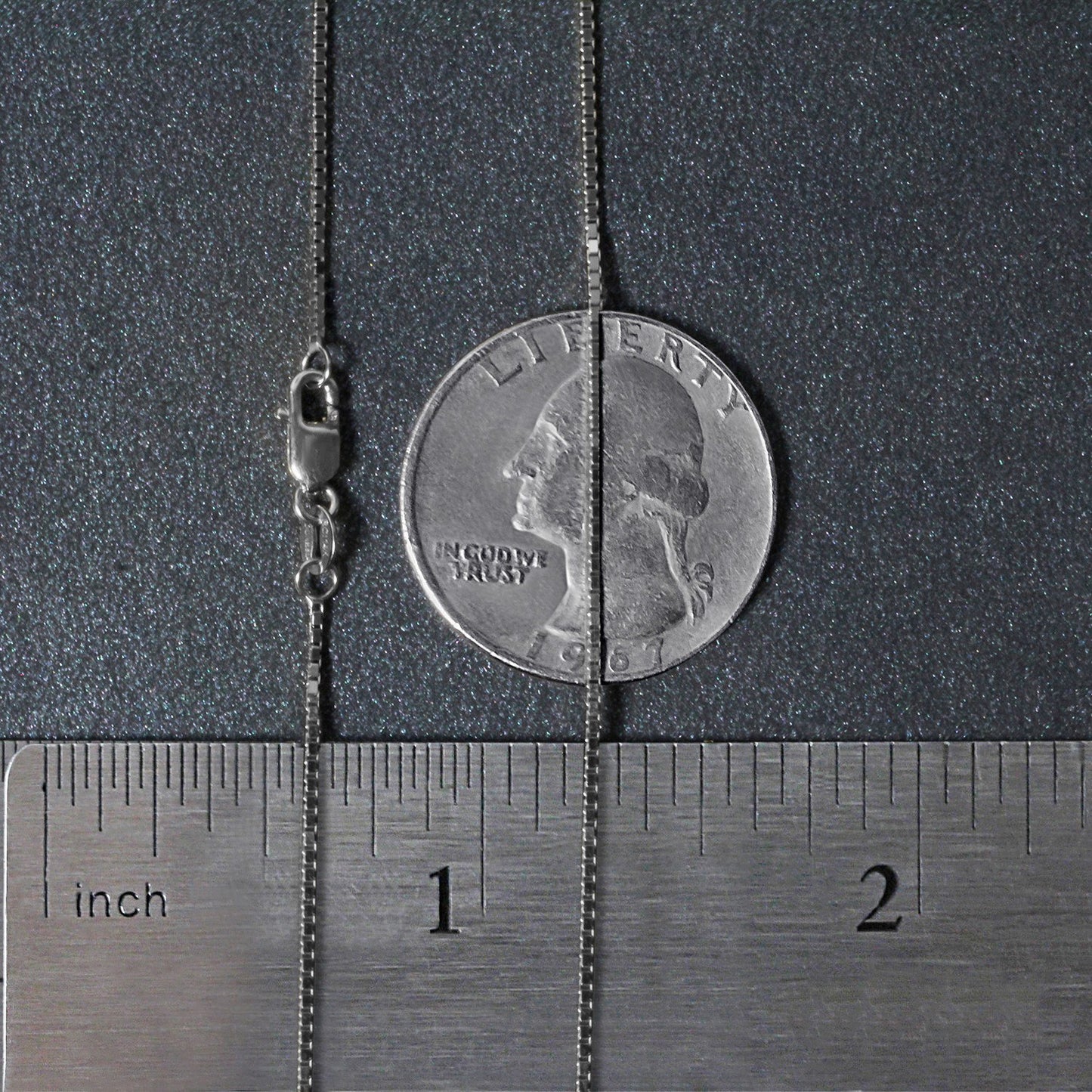 Peelerie jewelry piece in midnight luxury editorial product photo, high-contrast studio lighting