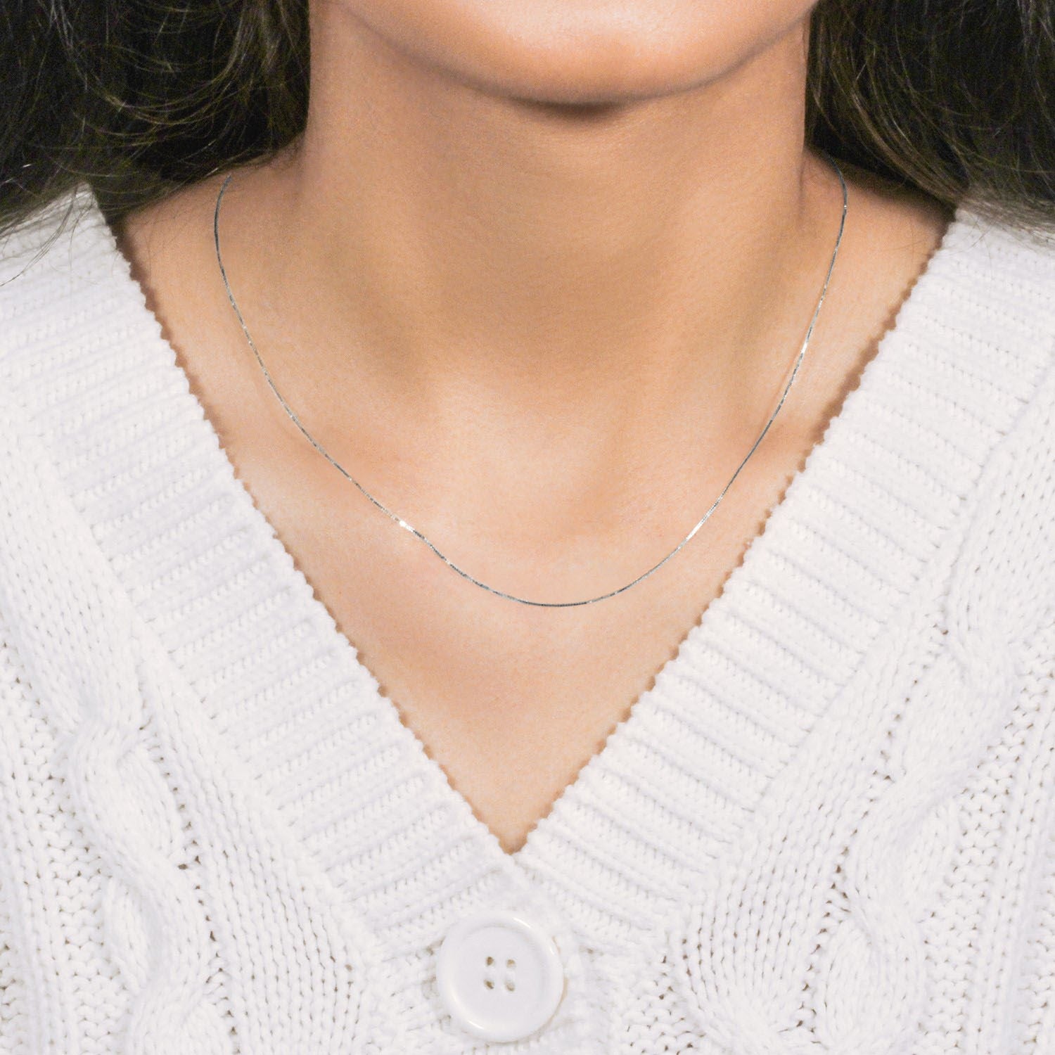 Peelerie jewelry piece in midnight luxury editorial product photo, high-contrast studio lighting