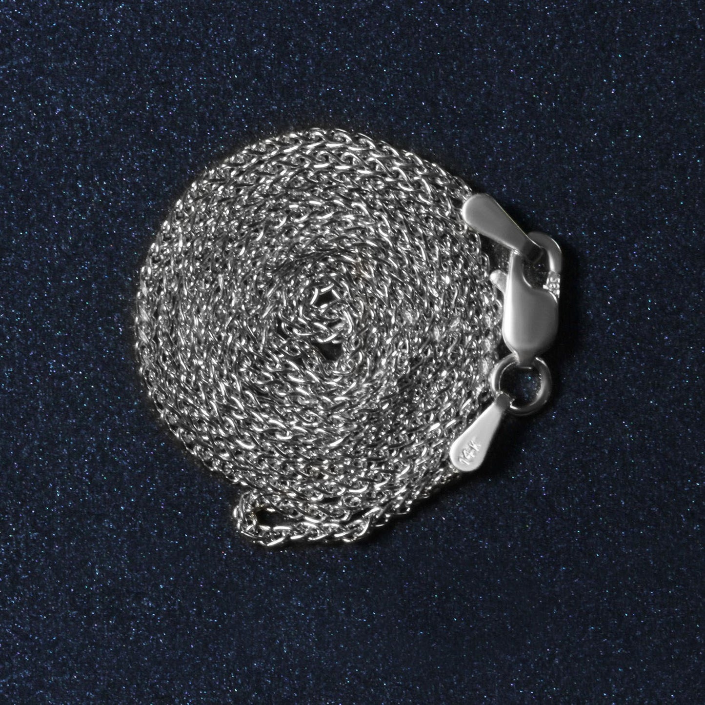 Peelerie jewelry piece in midnight luxury editorial product photo, high-contrast studio lighting