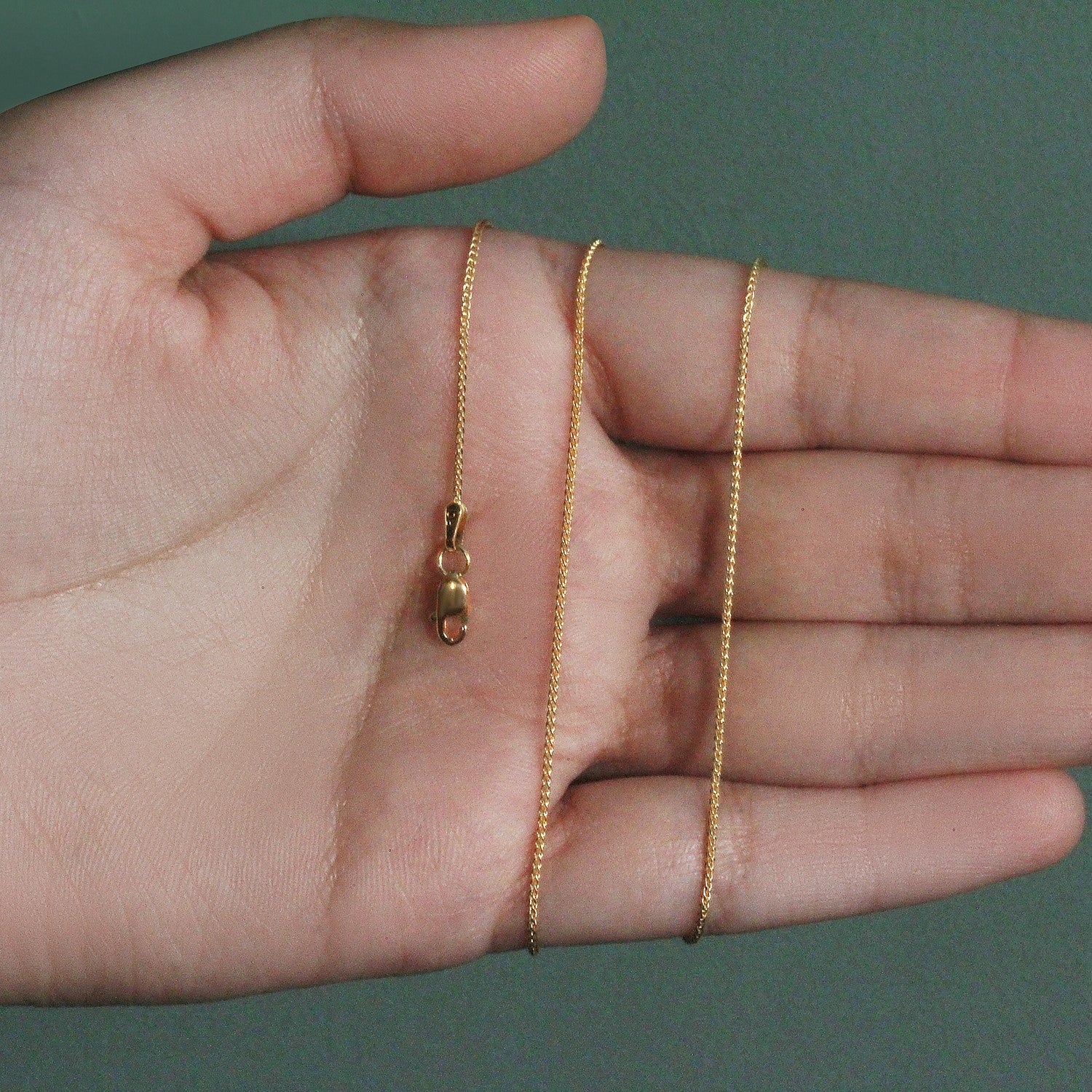 Peelerie jewelry piece in midnight luxury editorial product photo, high-contrast studio lighting