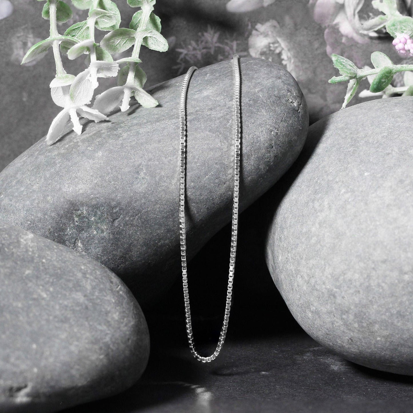 Peelerie jewelry piece in midnight luxury editorial product photo, high-contrast studio lighting