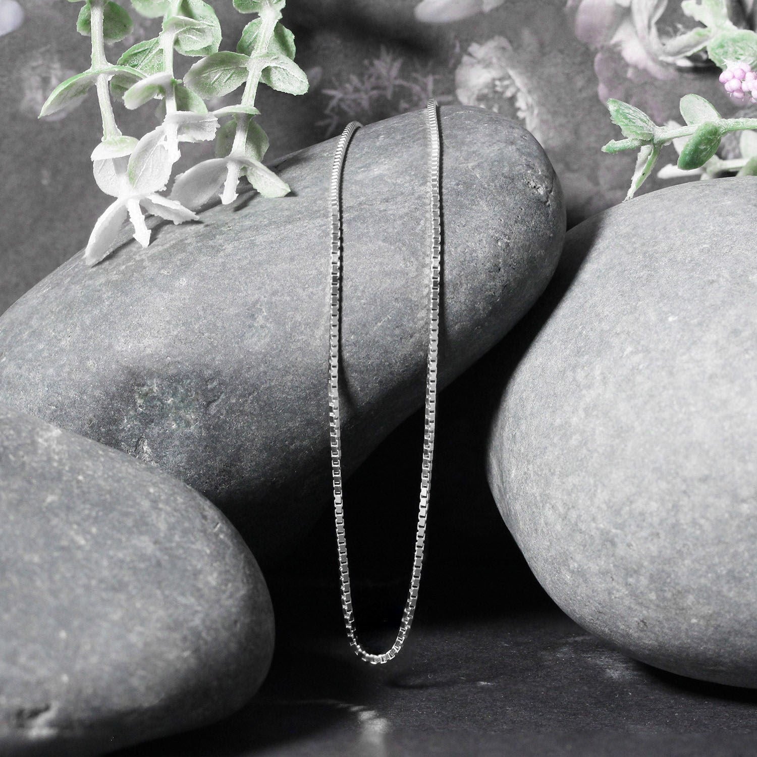 Peelerie jewelry piece in midnight luxury editorial product photo, high-contrast studio lighting