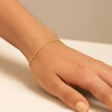 14k Yellow Gold Singapore Bracelet (1.10 mm) - Peelerie