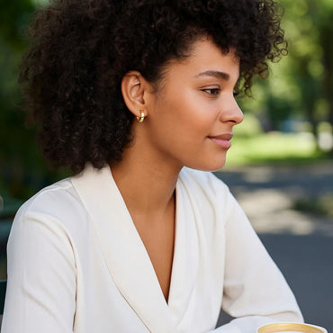 Peelerie jewelry piece in midnight luxury editorial product photo, high-contrast studio lighting