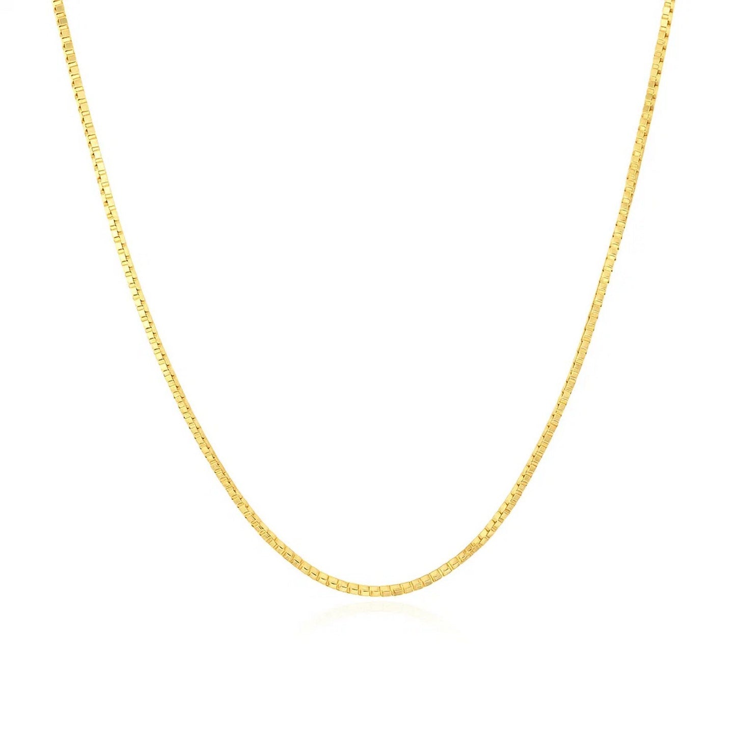 14k Yellow Gold Classic Box Chain (0.85 mm) in a sleek high-contrast midnight luxury editorial style