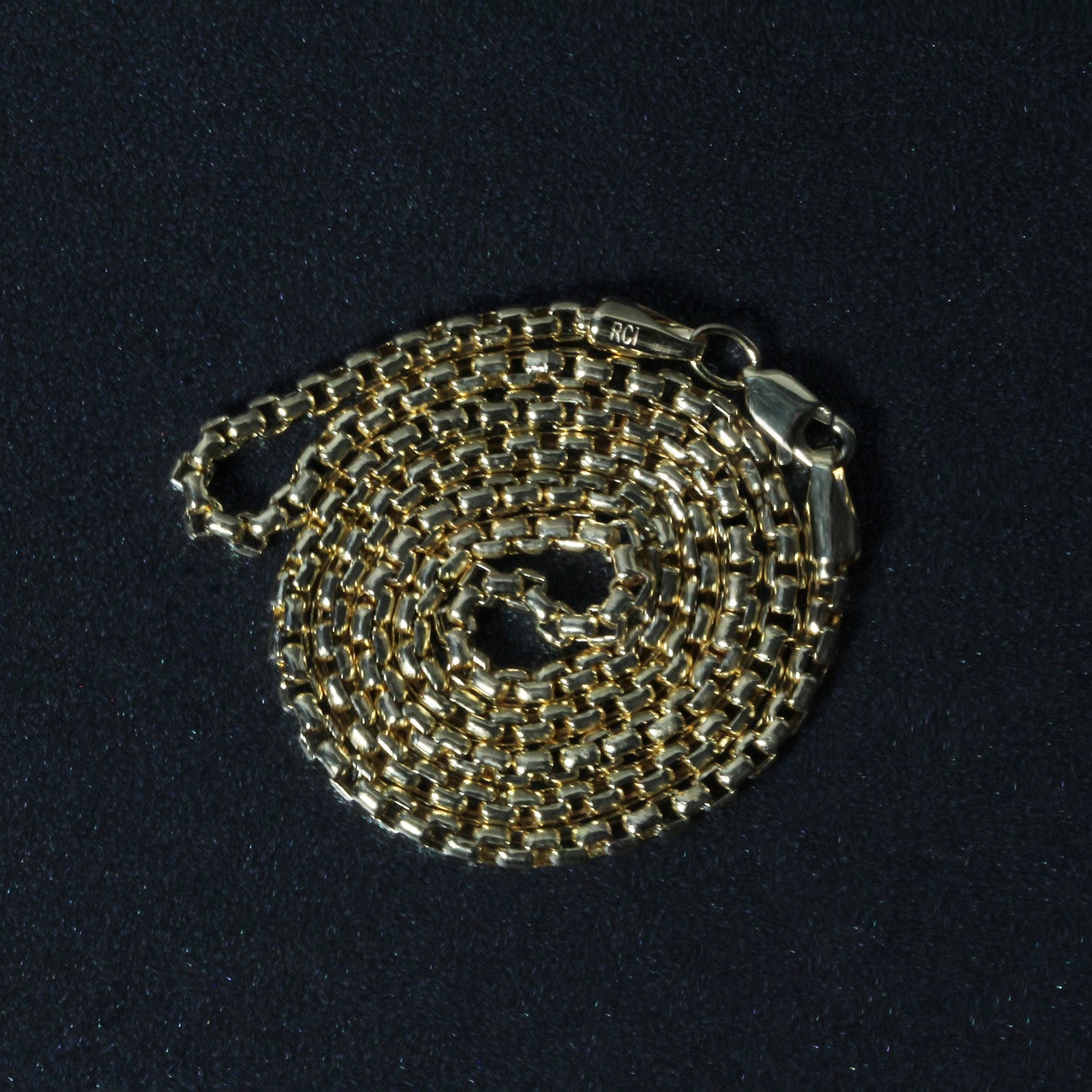 Peelerie jewelry piece in midnight luxury editorial product photo, high-contrast studio lighting