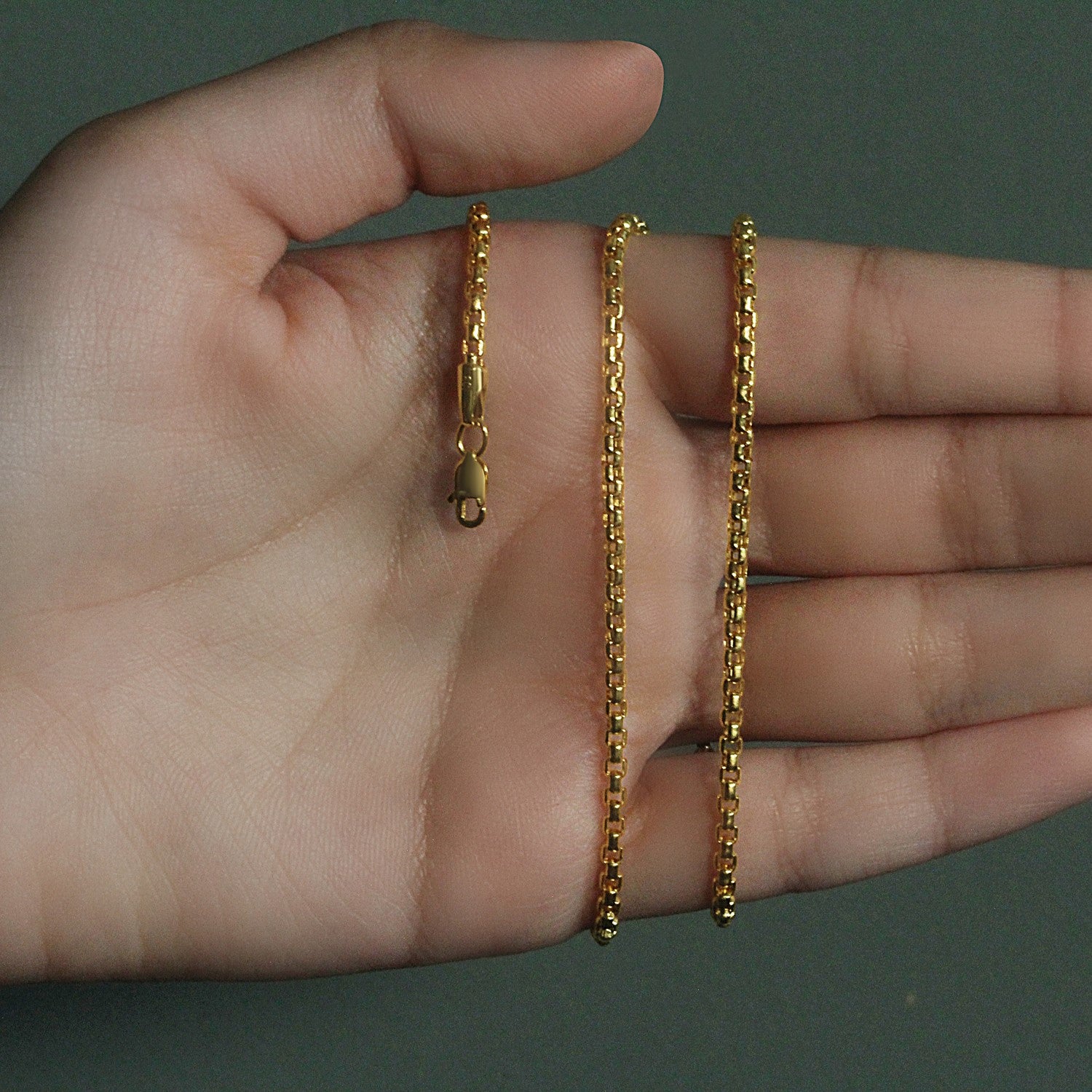 Peelerie jewelry piece in midnight luxury editorial product photo, high-contrast studio lighting