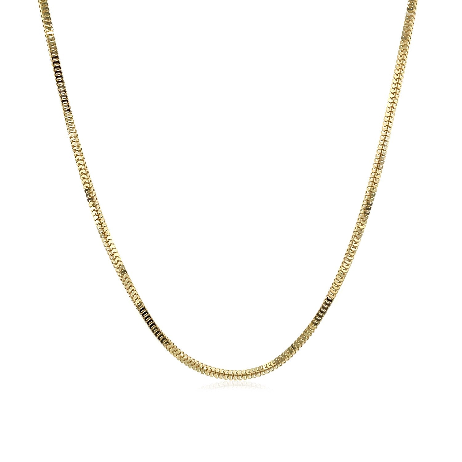 14k Yellow Gold Milano Chain (1.10 mm) in a sleek high-contrast midnight luxury editorial style