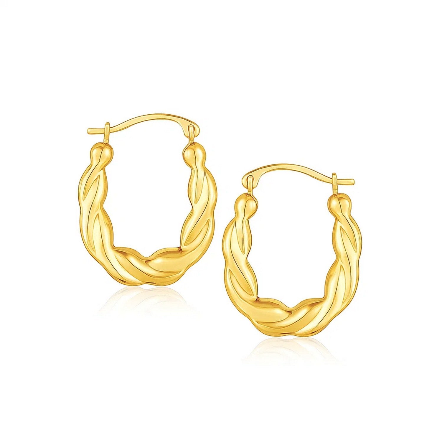 10k Yellow Gold Oval Twist Hoop Earrings in a sleek high-contrast midnight luxury editorial style