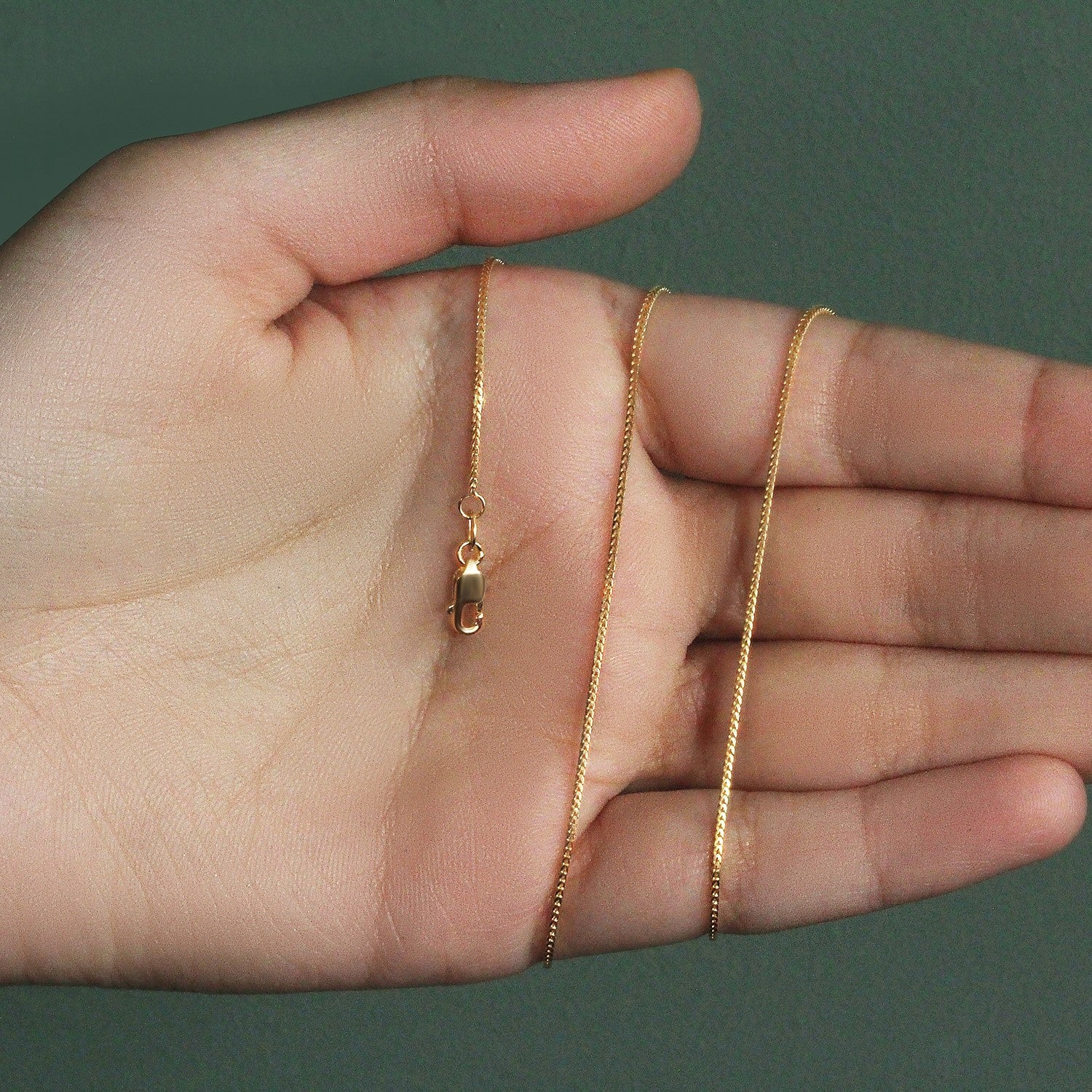 Peelerie jewelry piece in midnight luxury editorial product photo, high-contrast studio lighting