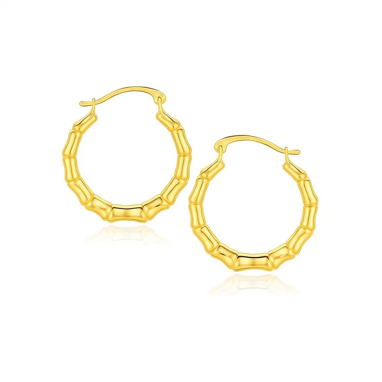 10k Yellow Gold Branch Motif Hoop Earrings in a sleek high-contrast midnight luxury editorial style