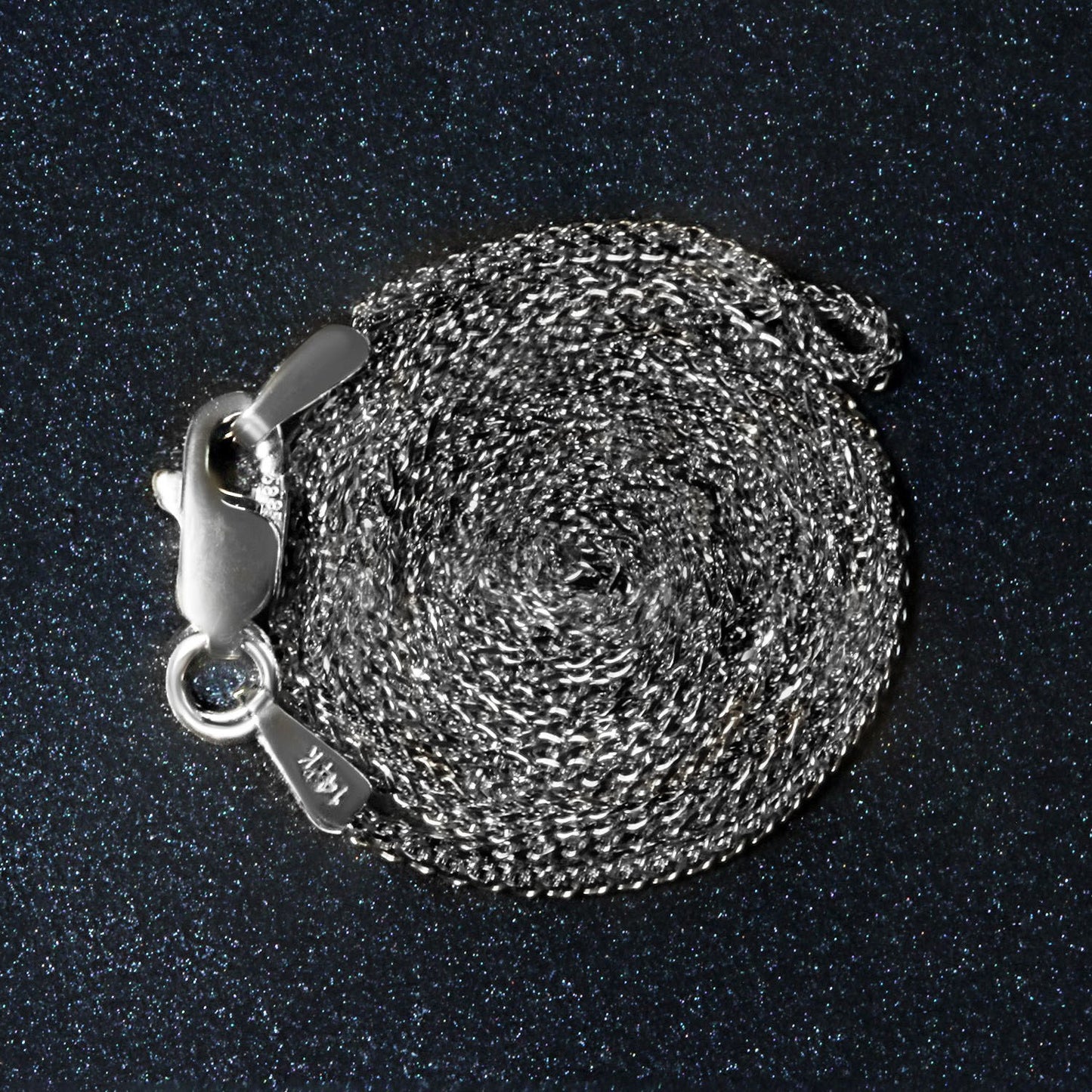 Peelerie jewelry piece in midnight luxury editorial product photo, high-contrast studio lighting