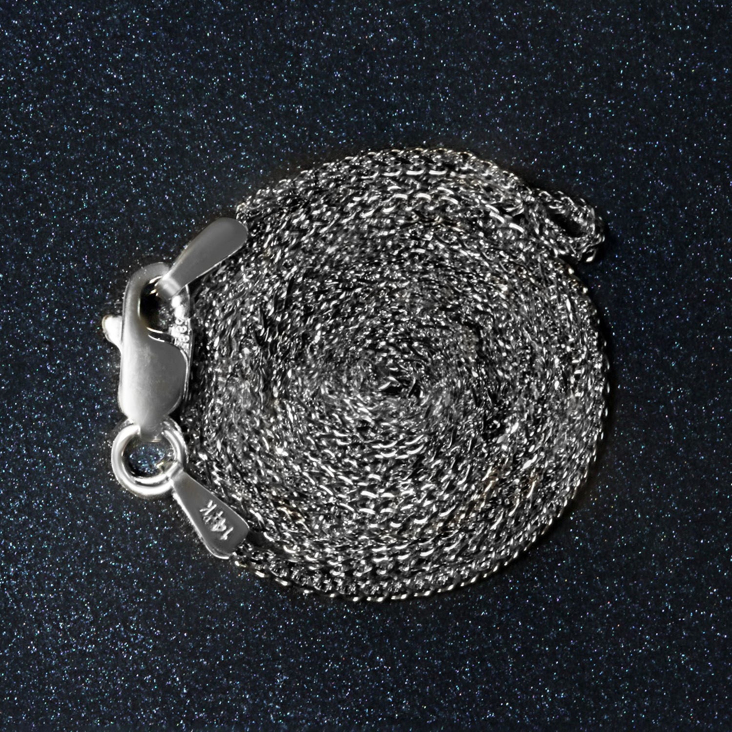 Peelerie jewelry piece in midnight luxury editorial product photo, high-contrast studio lighting