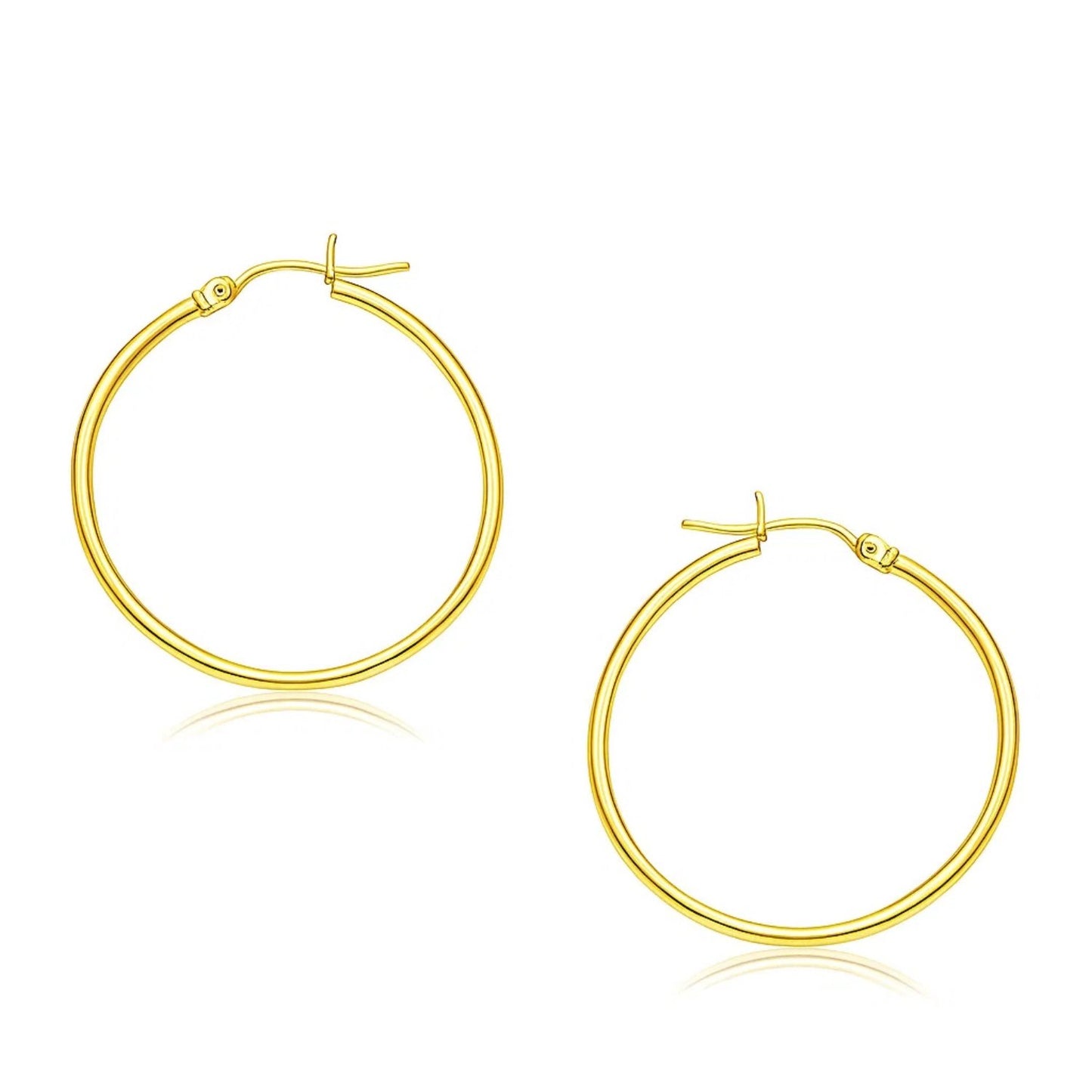 14k Yellow Gold Polished Hoop Earrings (2x30mm) in a sleek high-contrast midnight luxury editorial style