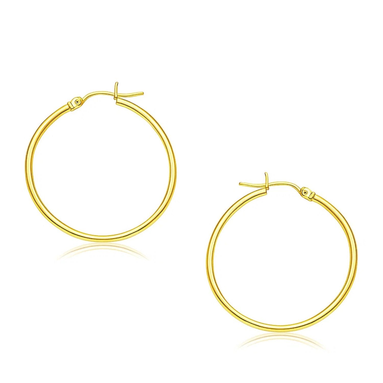 14k Yellow Gold Polished Hoop Earrings (2x30mm) in a sleek high-contrast midnight luxury editorial style