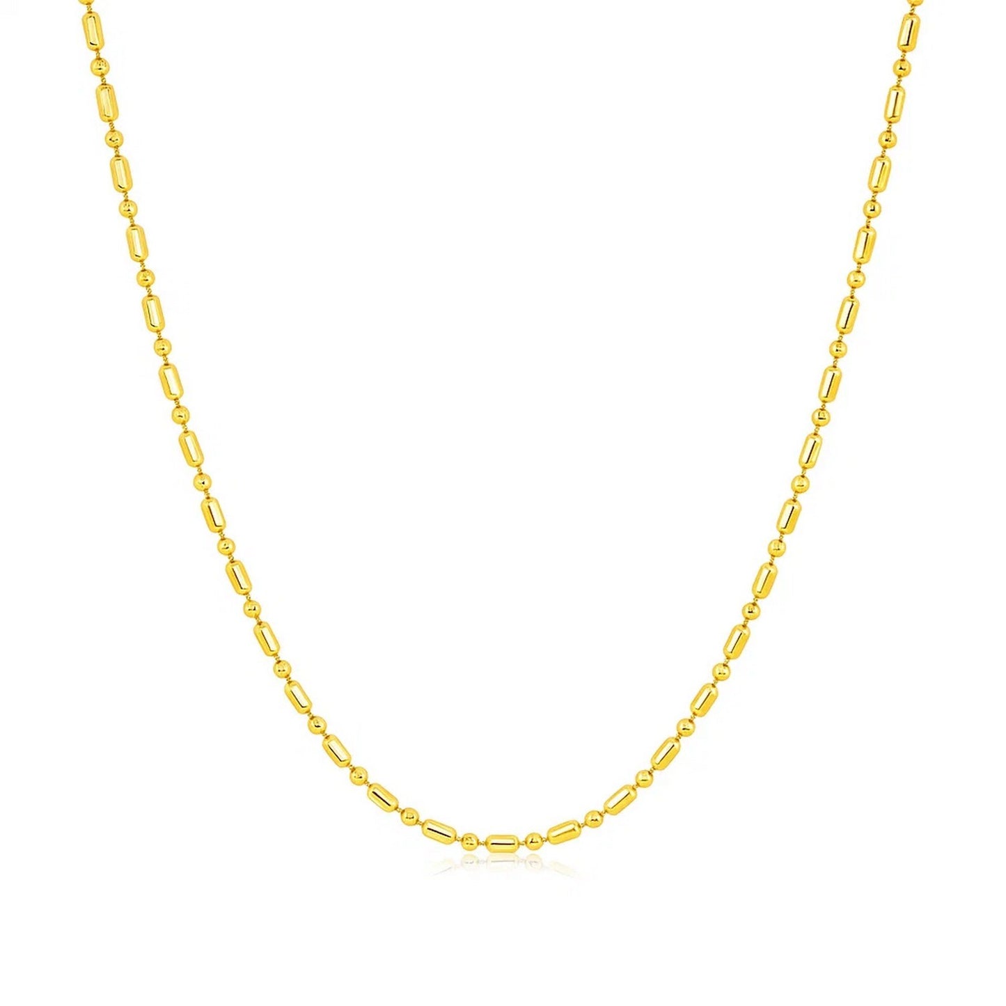14k Yellow Gold Diamond-Cut Alternating Bead Chain (1.10 mm) in a sleek high-contrast midnight luxury editorial style
